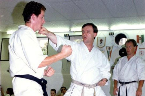 photo of Hanshi Thiry executing a technique on a student